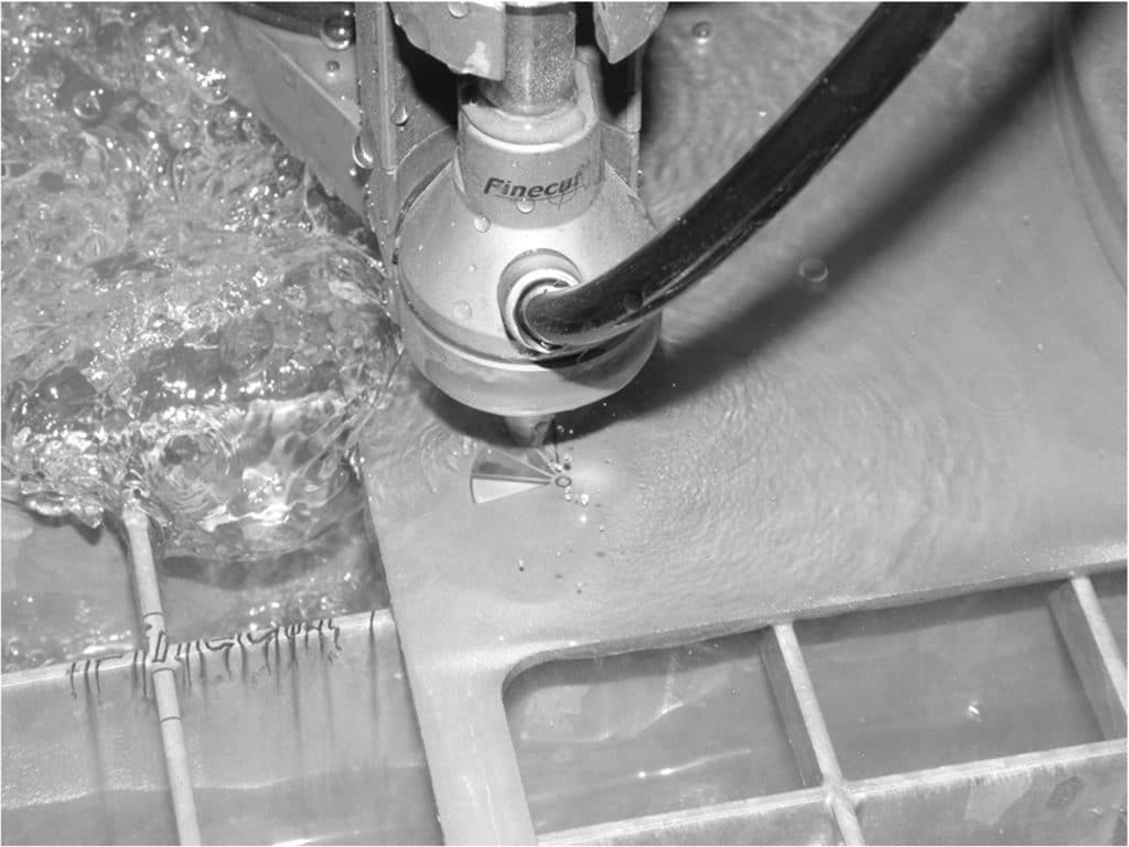 Fine Abrasive Waterjet Cutting with clear water